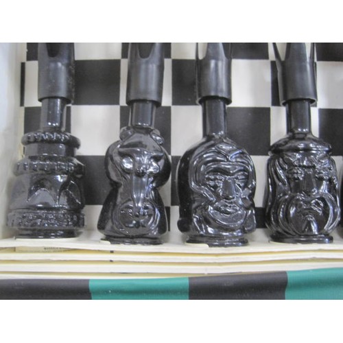 137 - Black Marsala Speciale chess game with eight miniatures (a/f box is tatty), and a boxed chrome pengu... 