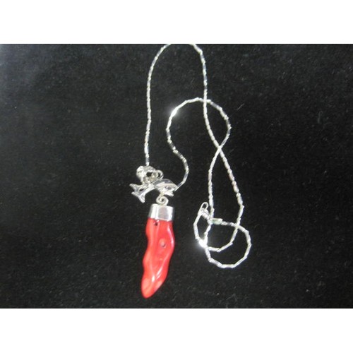 36 - 925 silver pendant set with opaque red glass to resemble coral specimen (length 4cm), suspended from... 