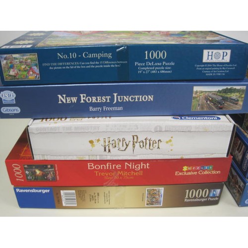 30 - Nine boxed jigsaw puzzles (not checked) including Gibbons 1000 piece, Harry Potter, Feline Frenzy et... 