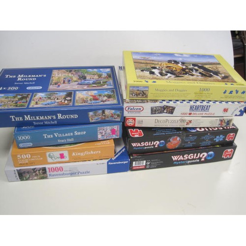 31 - Nine boxed jigsaw puzzles (not checked) including Falcon double-sided, WASGIJ mystery and Milkman's ... 