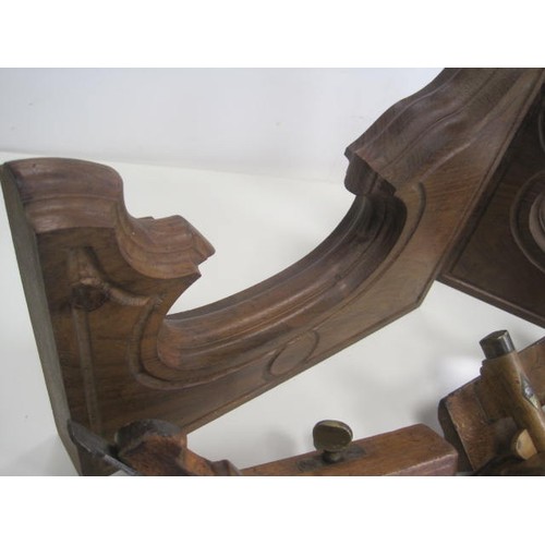 129 - A pair of hardwood wall brackets 14