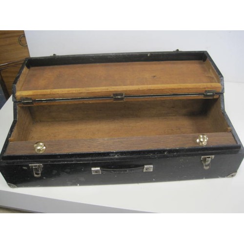 133 - A black painted carpenter's tool chest with internal drawer, 13