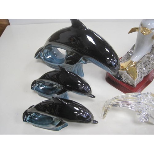 69 - Various Dolphins to include three Poole versions and others all as per pictures