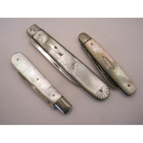 252 - Three silver and mother of pearl fruit knives - (1) handle with cross-hatch engraving and vacant bar... 