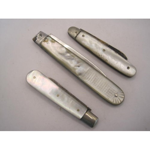 252 - Three silver and mother of pearl fruit knives - (1) handle with cross-hatch engraving and vacant bar... 