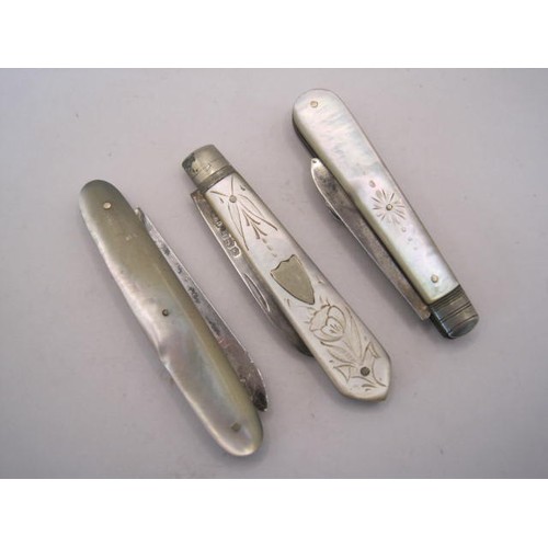 253 - A silver and mother of pearl fruit knife and boot hook, and two further fruit knives - (1) engraved ... 