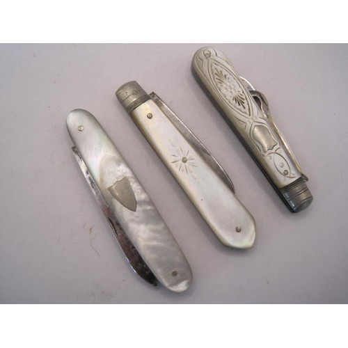 253 - A silver and mother of pearl fruit knife and boot hook, and two further fruit knives - (1) engraved ... 