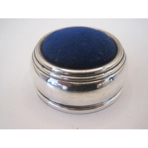 256 - Silver pin cushion, circular, diameter 54mm, blue velvet, marks for Birmingham, 1995, L J Millington... 