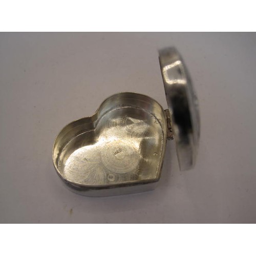 258 - 925 imported silver heart-shape pill box, cushion hinged lid engraved with foliage, stamped 925 with... 