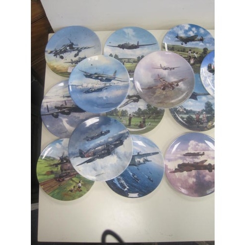 67 - A crate of collector plates from various manufacturers depicting military aircraft including Spitfir... 