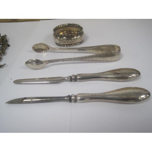 156 - Small silver items and an article of costume jewellery - silver sugar tongs with bright cut patterne... 