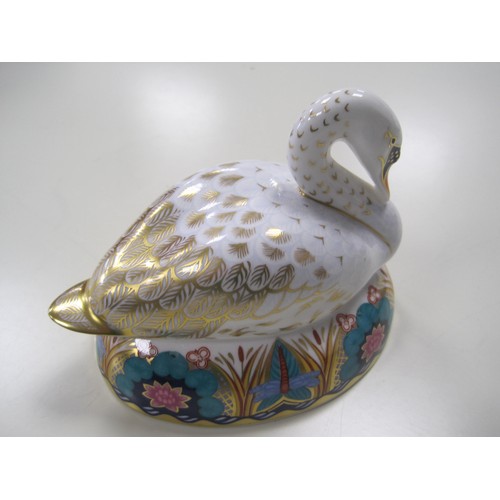 173 - Royal Crown Derby Swan, with silver stopper, retired 1999.
Unboxed but in good order