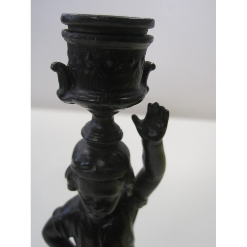 213 - E G Zimmerman Hanau figural candlestick as a child 12626, height 23cm, a/f repaired damage to one of... 