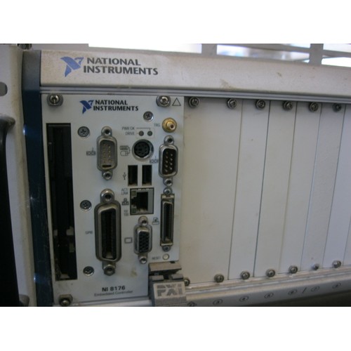 16 - A National Instruments PXI-1045 Controller Chassis  with some controllers. 19