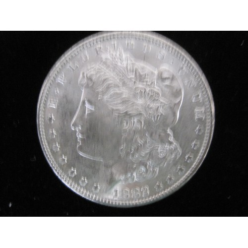 21 - An 1882 US Morgan Dollar