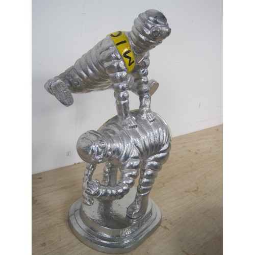 27 - Two large tin figure Michelin men