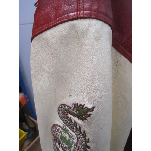 82 - Red and cream leather jacket, embroidered to the back and sleeves with dragons, size XL, labelled To... 