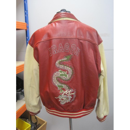 82 - Red and cream leather jacket, embroidered to the back and sleeves with dragons, size XL, labelled To... 