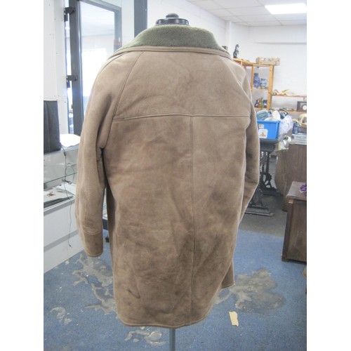 111 - (1) Gents beige sheepskin coat with brown leather buttons (a/f some stains to front and left sleeve)... 