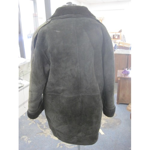 112 - Hide Society of Canada gents black double-breasted sheepskin coat (a/f grubby in places). Appears at... 