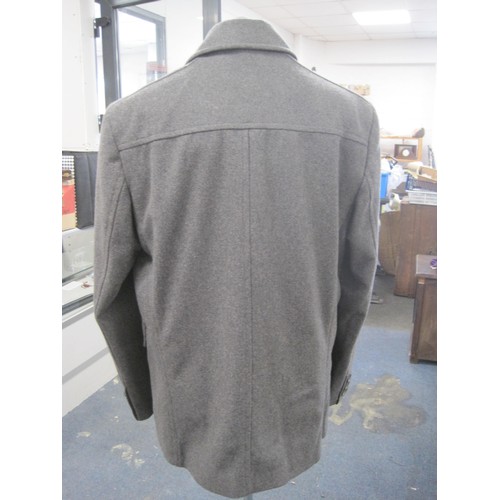 117 - Ted Baker 70% wool double-breasted grey three-quarter length coat. A/f hole to sleeve and hem of lef... 