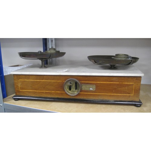 66 - Two sets of antique scales - (1) French cast iron shop balance marked Force 10kg with two brass tray... 