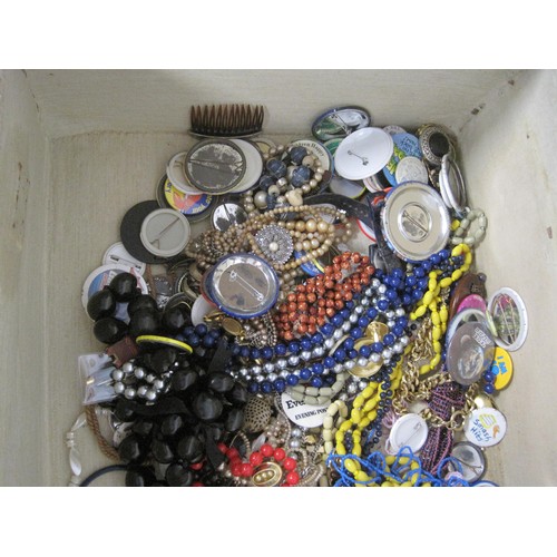 68 - Assorted costume jewellery including beaded necklaces and badges, in a vintage suitcase