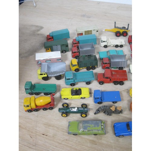 67 - Two boxes of die cast model vehicles, mainly cars and lorries, several Matchbox Lesney. In all about... 