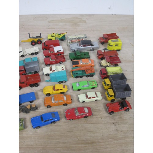 67 - Two boxes of die cast model vehicles, mainly cars and lorries, several Matchbox Lesney. In all about... 