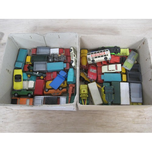 67 - Two boxes of die cast model vehicles, mainly cars and lorries, several Matchbox Lesney. In all about... 