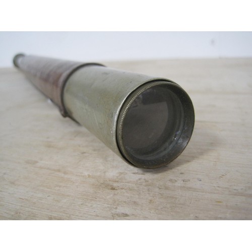 92 - A telescope manufactured by T Cooke and sons  in good condition .
length when pulled   inches