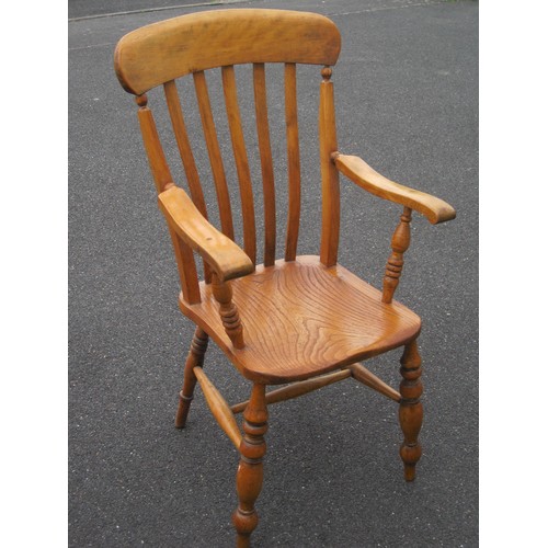 107 - A Victorian or early Edwardian farmhouse armchair in good condition