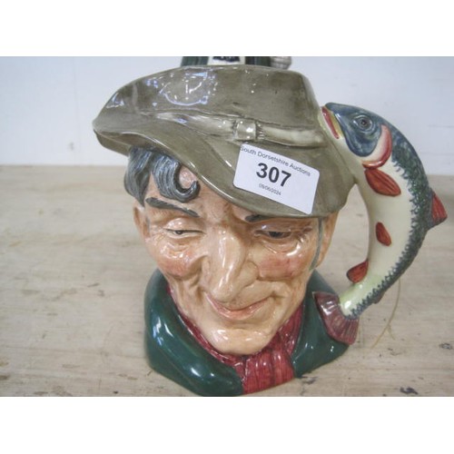 217 - A pair of resin Oriental-style figures, a vintage Black Watch decanter and a Toby jug