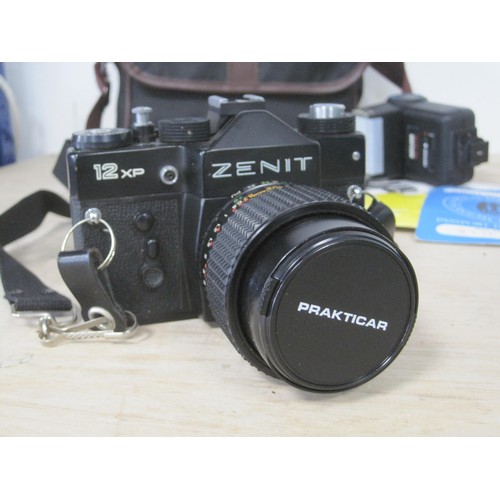 184 - Zenit 12XP 35mm SLR camera with Helios 28-70mm auto zoom lens, Helios 38 Auto flash with instruction... 