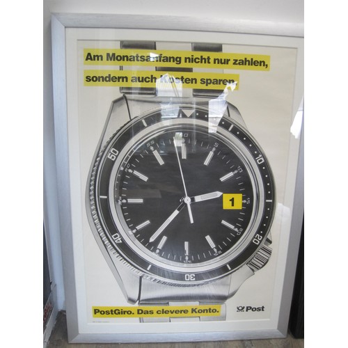 46 - A framed and glazed medium sized Deutsche Post advertising print featuring a watch and a pair of fra... 