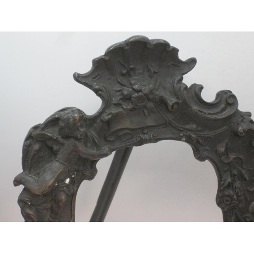 154 - A pair of bronze cherub photo frames