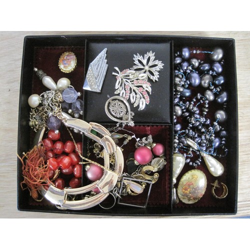 155 - A selection of costume jewellery in a black leather box