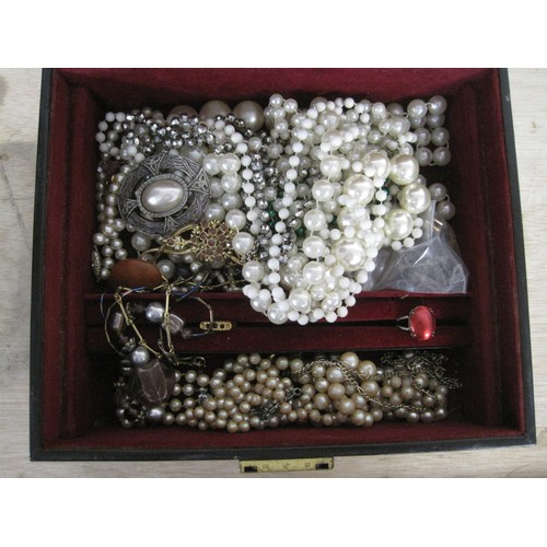 155 - A selection of costume jewellery in a black leather box