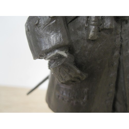 159 - A bronzed figure of a man with a musket by Peter Hicks (a/f)