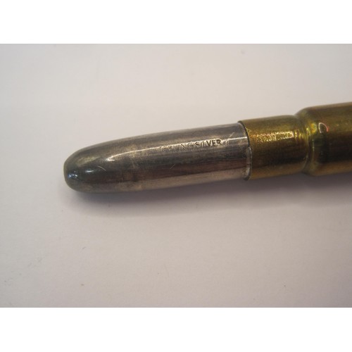 166 - A bullet pencil from Princess Mary 1914 Gift Tin, the cartridge with crowned 'M' monogram and the bu... 