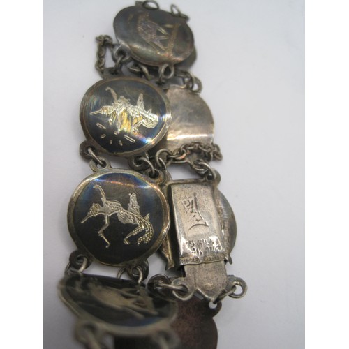 170 - A Siam Niello silver panel bracelet and similar brooch, 20.5g approx weight