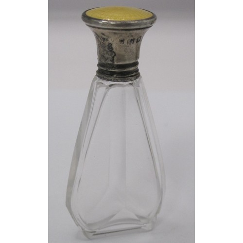 172 - A silver and yellow enamel lidded scent bottle and a floral porcelain example with white metal lid