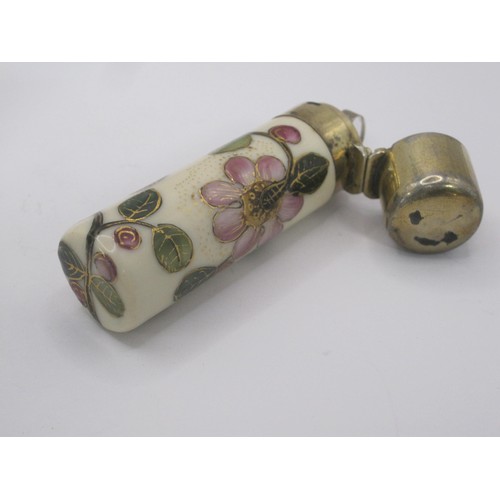 172 - A silver and yellow enamel lidded scent bottle and a floral porcelain example with white metal lid