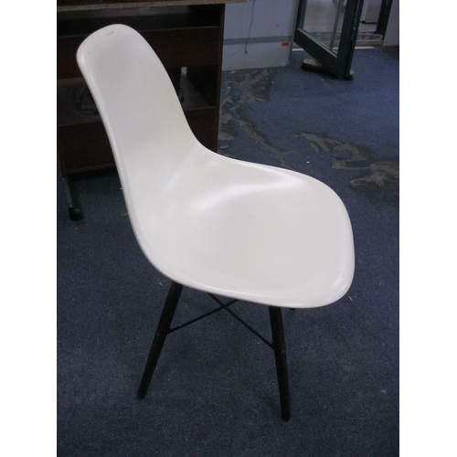 241 - 4 retro-style white chairs of interesting design