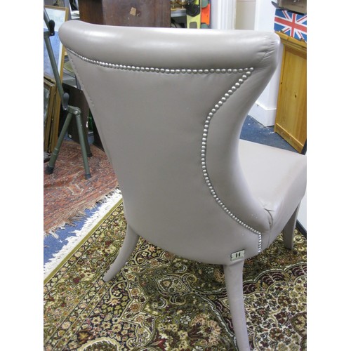 11 - A set of 6 Kelly Hoppen leather upholstered dining chairs in very good order x2 creamy beige and oth... 