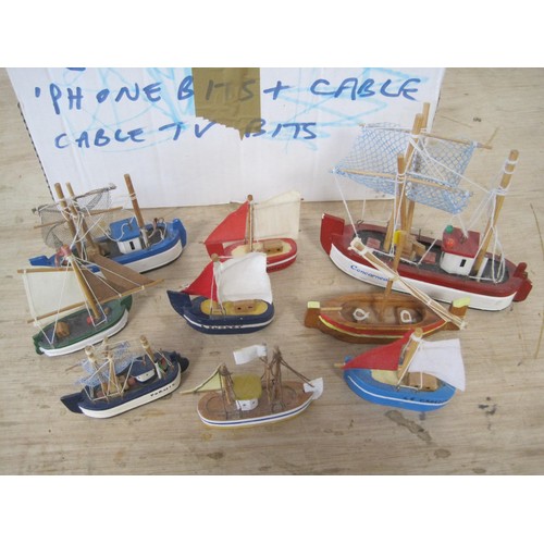 108 - A selection of novelty toy boats ,mostly wood or resin all as per pictures