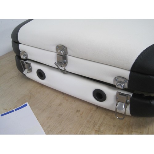 244 - A portable massage table in carry case, in good condition