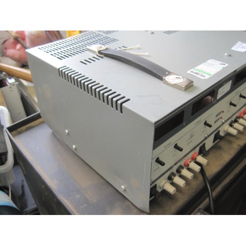 51 - A Thurlby Thandar Instruments triple-programmable stabilised power supply unit, powers on but otherw... 