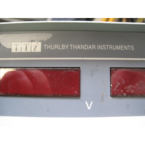 51 - A Thurlby Thandar Instruments triple-programmable stabilised power supply unit, powers on but otherw... 