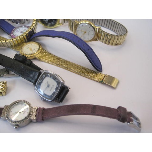 62 - An assortment of thirteen ladies quartz wrist watches, including Lorus, Limit, Sekonda, Rotary etc. ... 